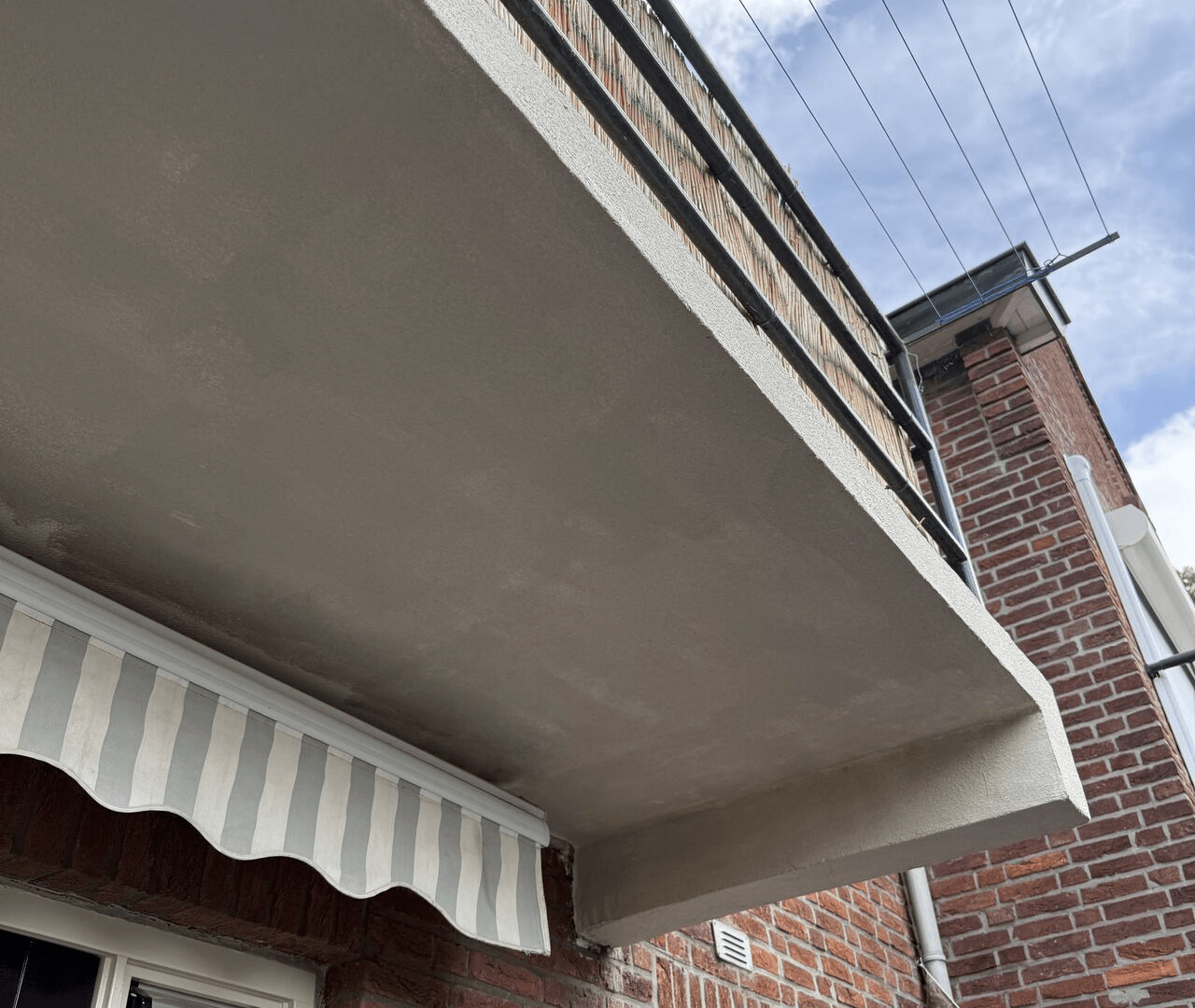 Afbeelding voor: Zo pak je een beschadigd balkon écht goed aan 